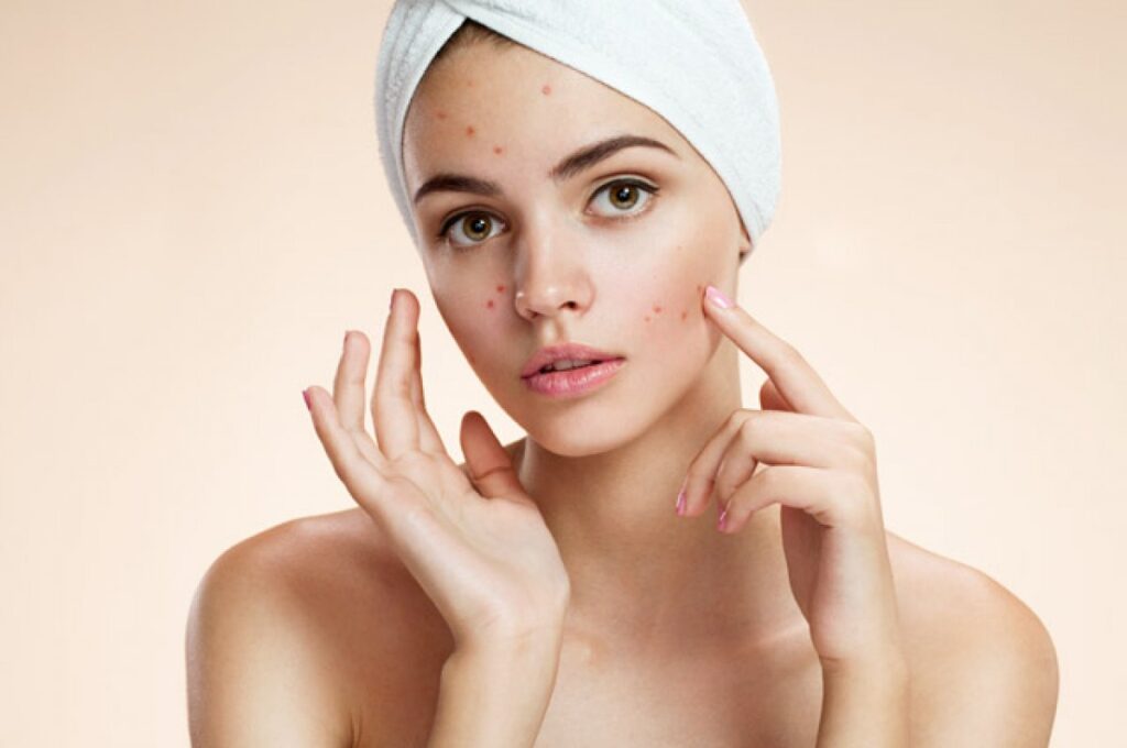 Professional dermatologist consulting patient about skin treatment